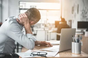 Man reviewing documents for lost wages claim with personal injury lawyers in Hillsboro Oregon