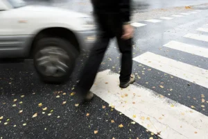 Accident scene showing pedestrian and vehicle for legal consultation in Hillsboro Oregon
