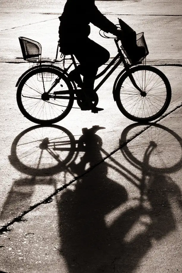 Silhouette of cyclist with legal guidance from Kehoe Sands Law