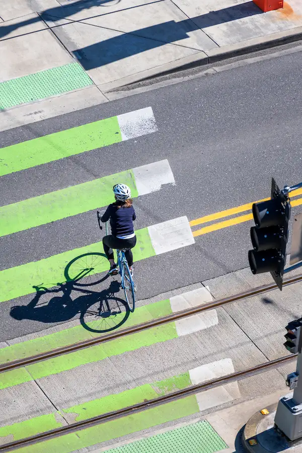 Bike crossing the street, avoiding accident