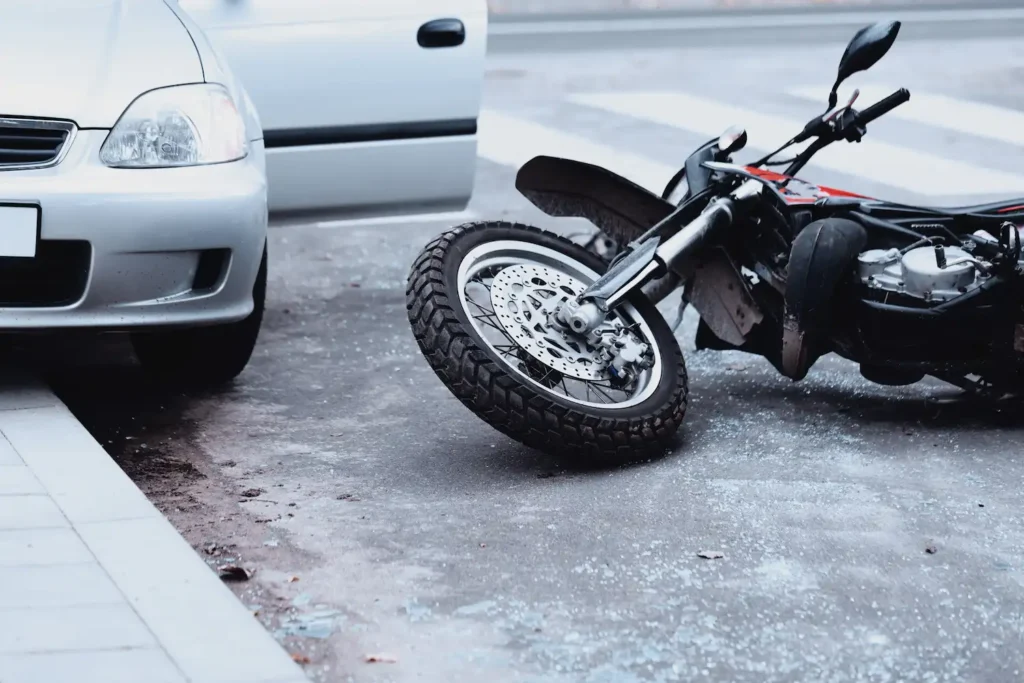 Motorcycle on side of road after accident with access to legal help in Hillsboro Oregon