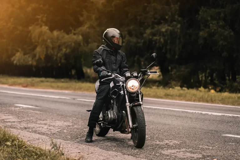 Man on motorcycle needing injury lawyer service from Kehoe Sands Law in Hillsboro OR